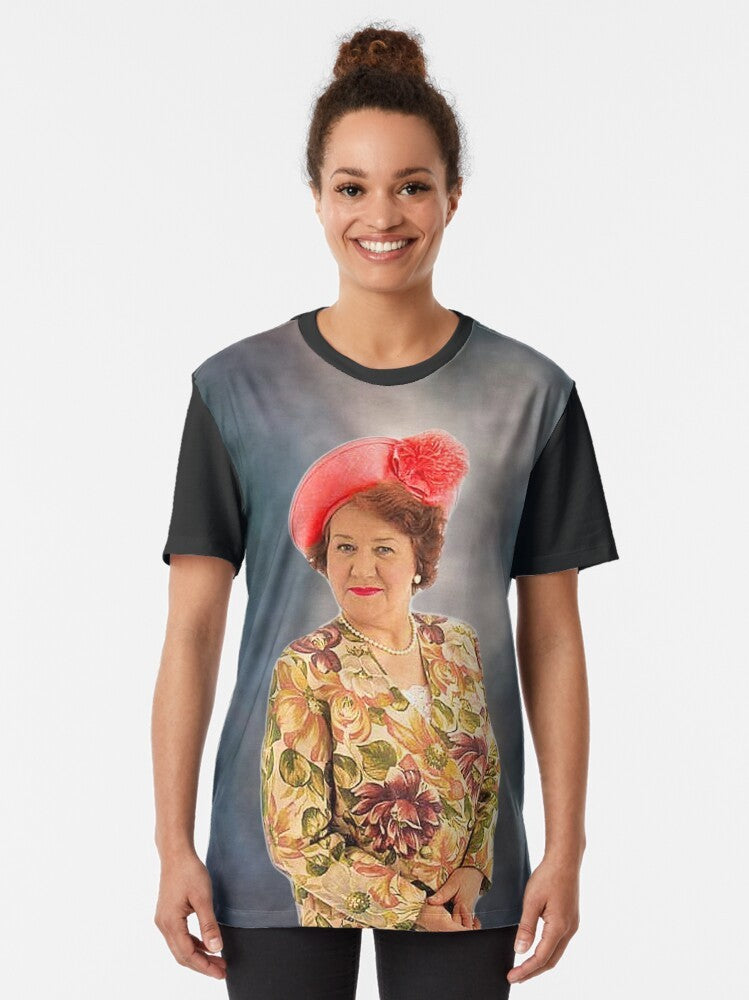 A graphic t-shirt featuring the iconic character Hyacinth Bucket from the British sitcom "Keeping Up Appearances". - Women