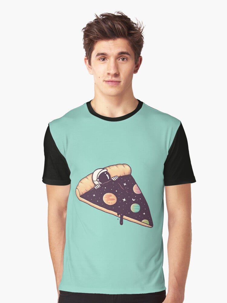 Graphic t-shirt featuring a surreal design of an astronaut enjoying a slice of pizza in the vast cosmos - Men