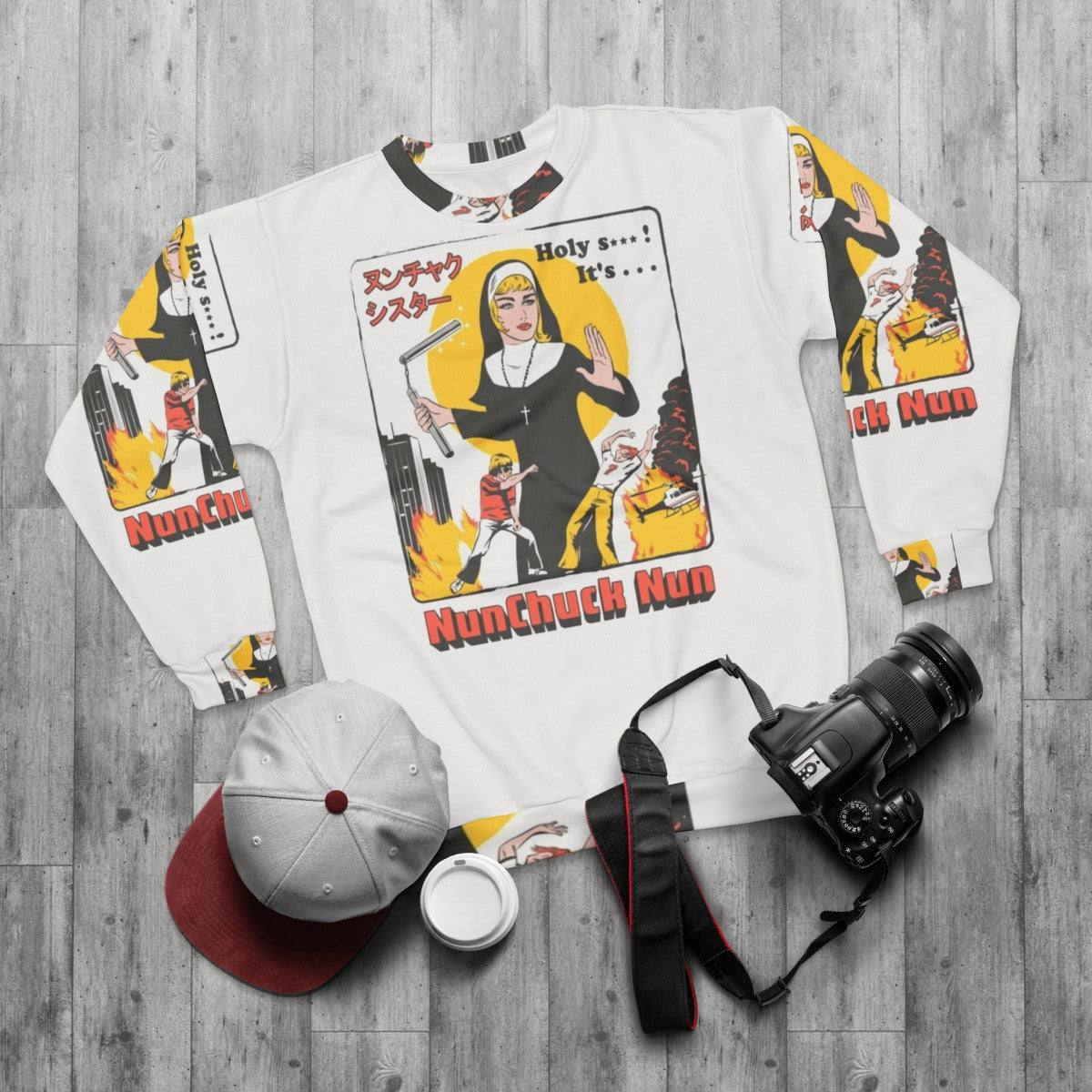 Nunchaku nun sweatshirt with retro pop culture design - flat lay