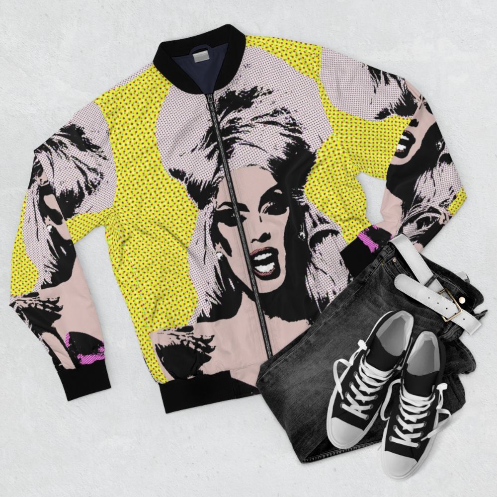 A colorful and vibrant Alaska-inspired pop art bomber jacket with drag queen influences. - Flat lay