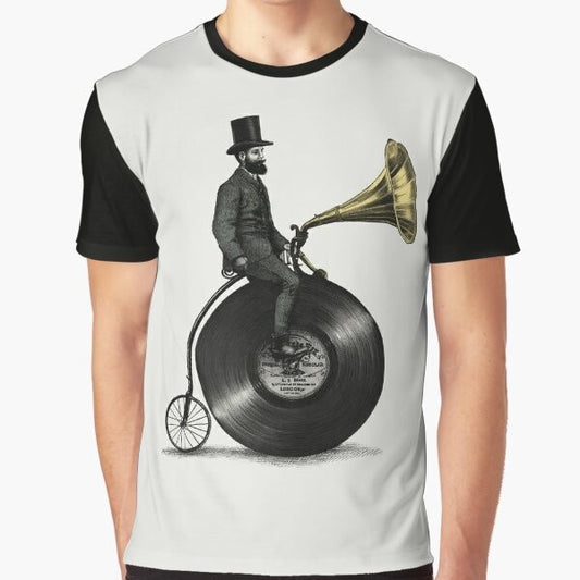 Vintage-inspired graphic t-shirt with music and cycling motifs, featuring a man with a top hat, beard, and moustache riding a penny farthing bicycle.