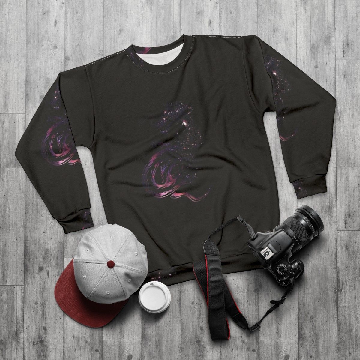 Cosmic dragon sweatshirt featuring a mythological creature design - flat lay