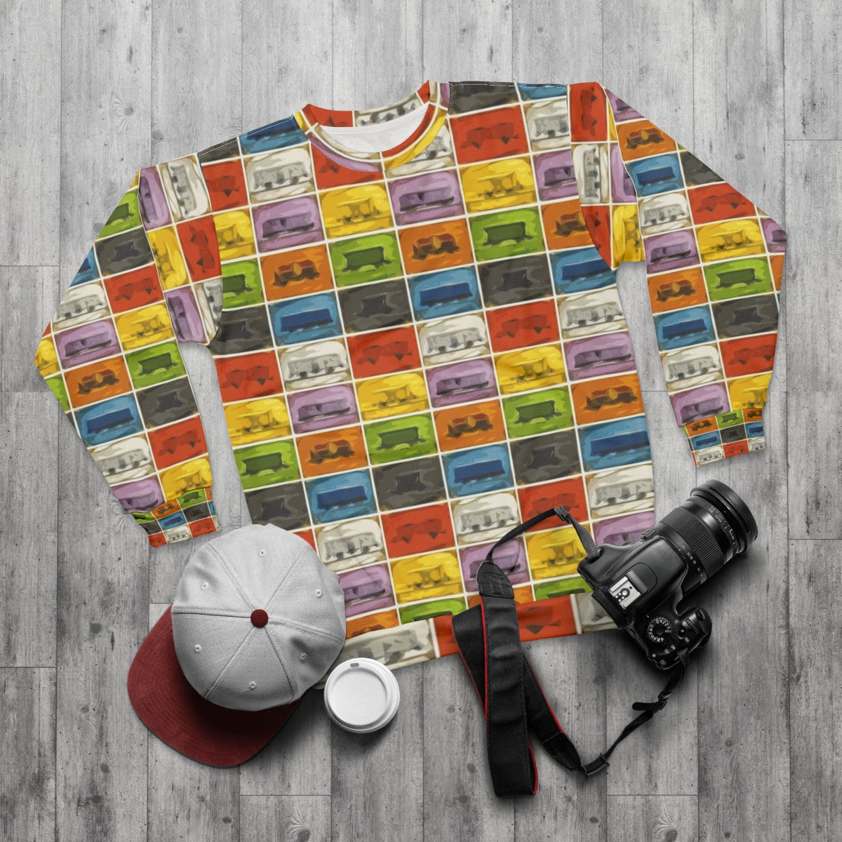 Retro board game lover wearing a Ticket to Ride-themed sweatshirt - flat lay