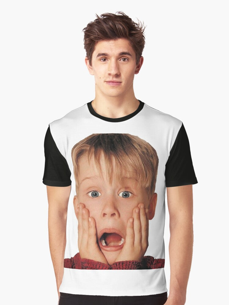 Macaulay Culkin wearing a red shirt in the iconic "Home Alone" movie poster graphic on a t-shirt - Men