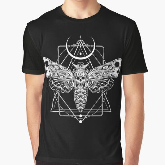 Surreal death moth graphic with skulls, horns, and dark art elements on a black t-shirt.