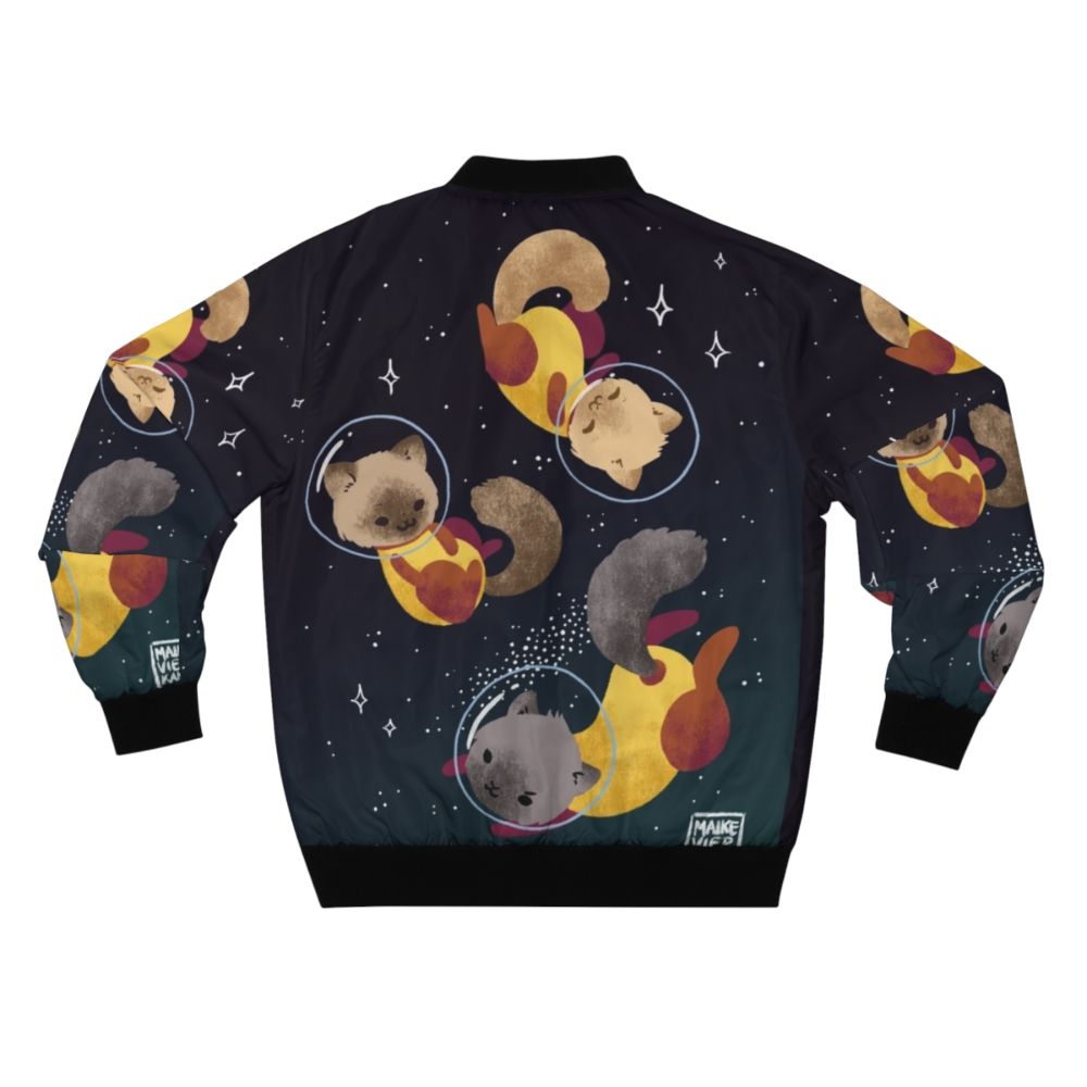 Cute and fun space cats illustration on a bomber jacket, featuring a cosmic design with stars, planets, and a playful feline astronaut. - Back