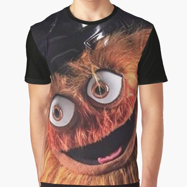 Gritty, the Philadelphia Flyers' new mascot, with a bold, graphic design on a t-shirt.