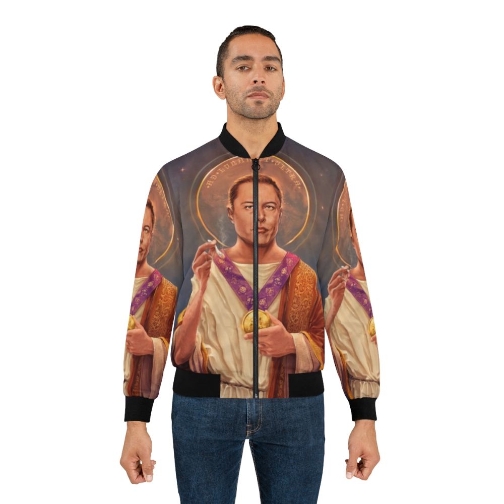 Elon Musk "Saint Elon" Pop Art Bomber Jacket featuring a religious-themed portrait of Elon Musk against a space background. - Lifestyle