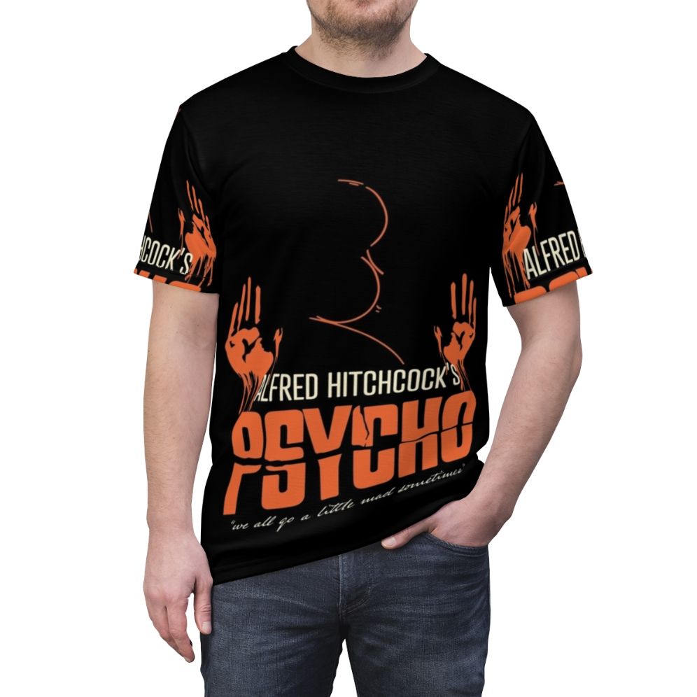 Vintage inspired t-shirt featuring an abstract portrait design of iconic director Alfred Hitchcock and references to his classic thriller film "Psycho" - men front