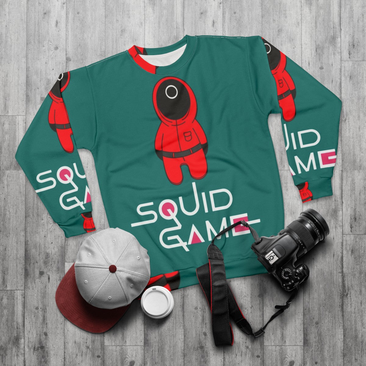 Squid Game Collection Sweatshirt featuring characters and symbols from the Netflix series - flat lay