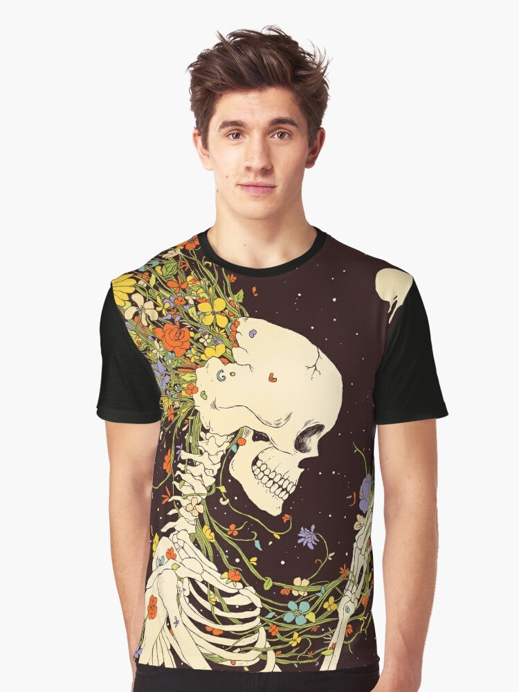 Surreal graphic t-shirt featuring a skull and skeleton design with floral and celestial elements, representing the beauty and impermanence of existence. - Men