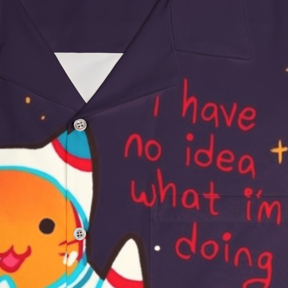 Cat astronaut wearing a Hawaiian-style shirt with positive affirmation - Detail