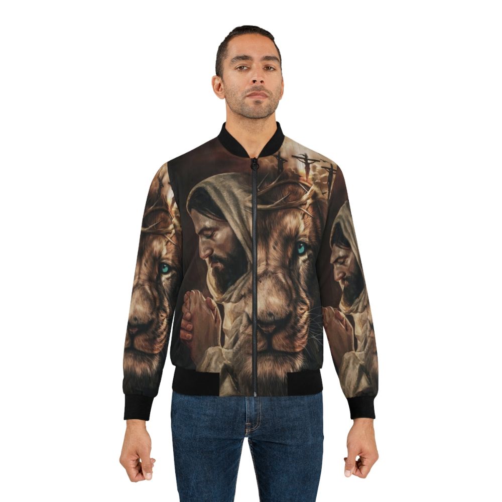 A stylish bomber jacket featuring the text "Jesus Pray and the Lion of Judah" - Lifestyle