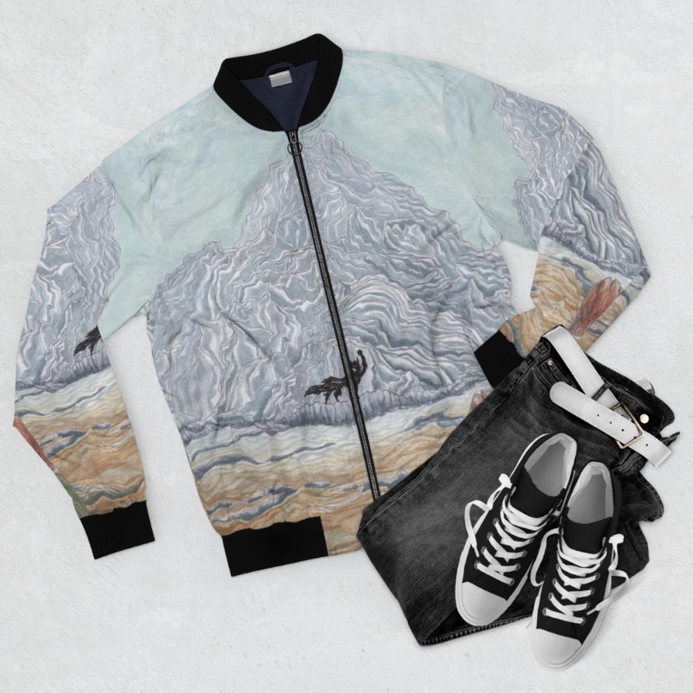 Wes Anderson "The Winter Wolf" Fantastic Mr. Fox inspired bomber jacket with watercolor illustrations of a wolf, fox, and mountain landscape. - Flat lay