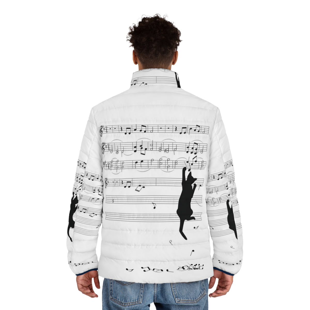 A playful kitten dressed in a puffer jacket, surrounded by sheet music and musical instruments - men back