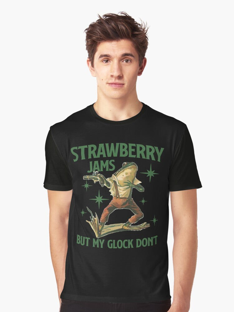 Graphic t-shirt featuring the text "Strawberry Jams But My Glock Don't" on a white background. - Men