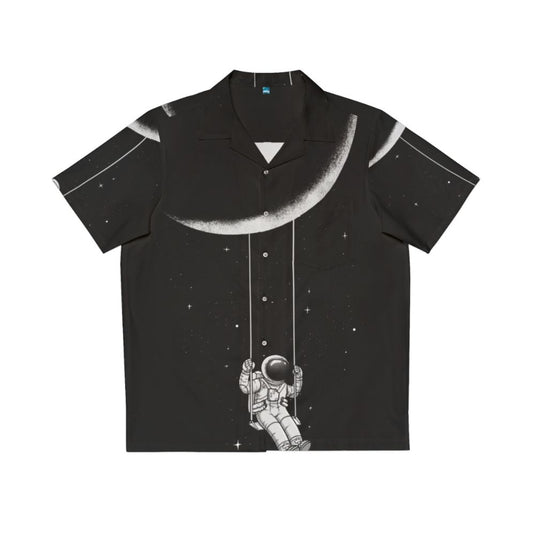 Man wearing a black and white Hawaiian shirt with a surreal, space-inspired design