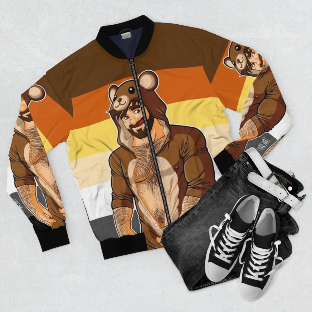 A bomber jacket featuring a bold bear pride design with a cute bobo bear illustration - Flat lay