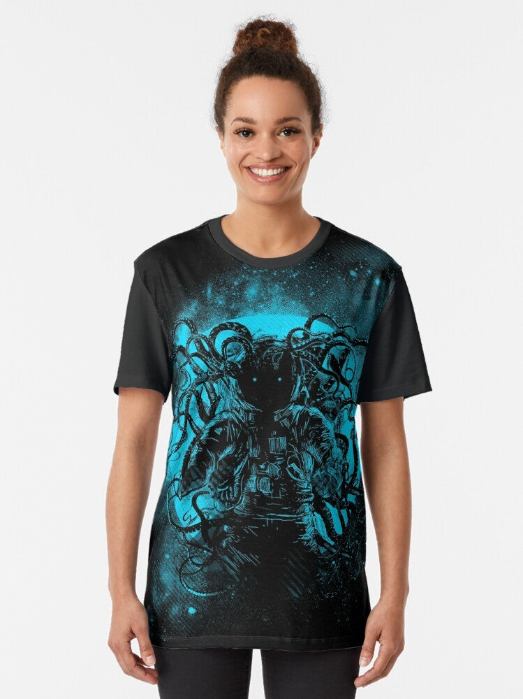 Cthulhu, the terrifying cosmic horror from the works of H.P. Lovecraft, depicted on a space-themed graphic t-shirt. - Women