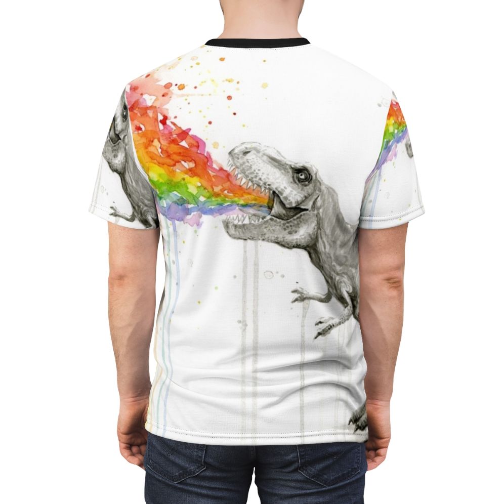 Whimsical illustration of a T-Rex dinosaur vomiting a rainbow of colors on a colorful t-shirt. - men back