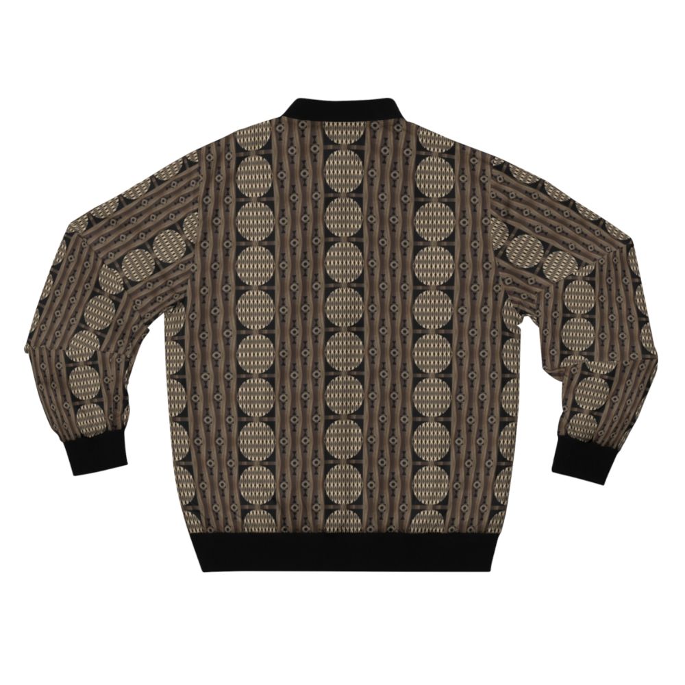 Primal patterns in gold, brown, and black bomber jacket designed by Helena Tiainen - Back