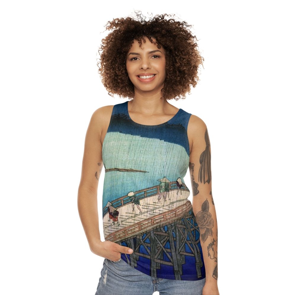 Unisex tank top featuring the Japanese ukiyo-e artwork "Sudden Shower Over Shin Ohashi Bridge" by Hiroshige - women