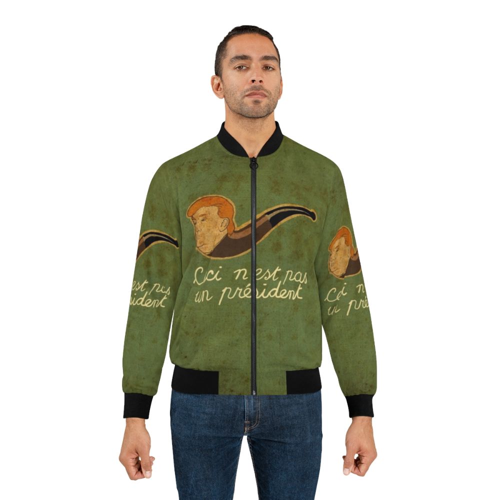 Surreal bomber jacket with "This is Not a President" design, inspired by Rene Magritte's surrealist artwork - Lifestyle