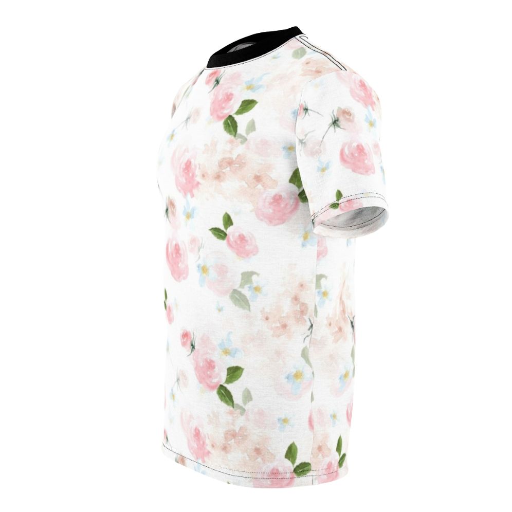 A close-up image of a blush pink floral botanical print design on a t-shirt. - men left