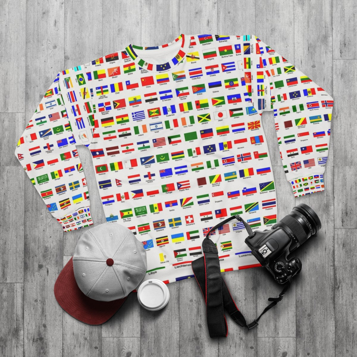 Sweatshirt featuring flags of countries around the world - flat lay