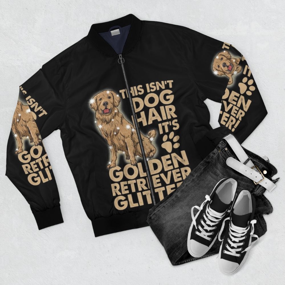 Golden retriever dog wearing a glitter bomber jacket - Flat lay