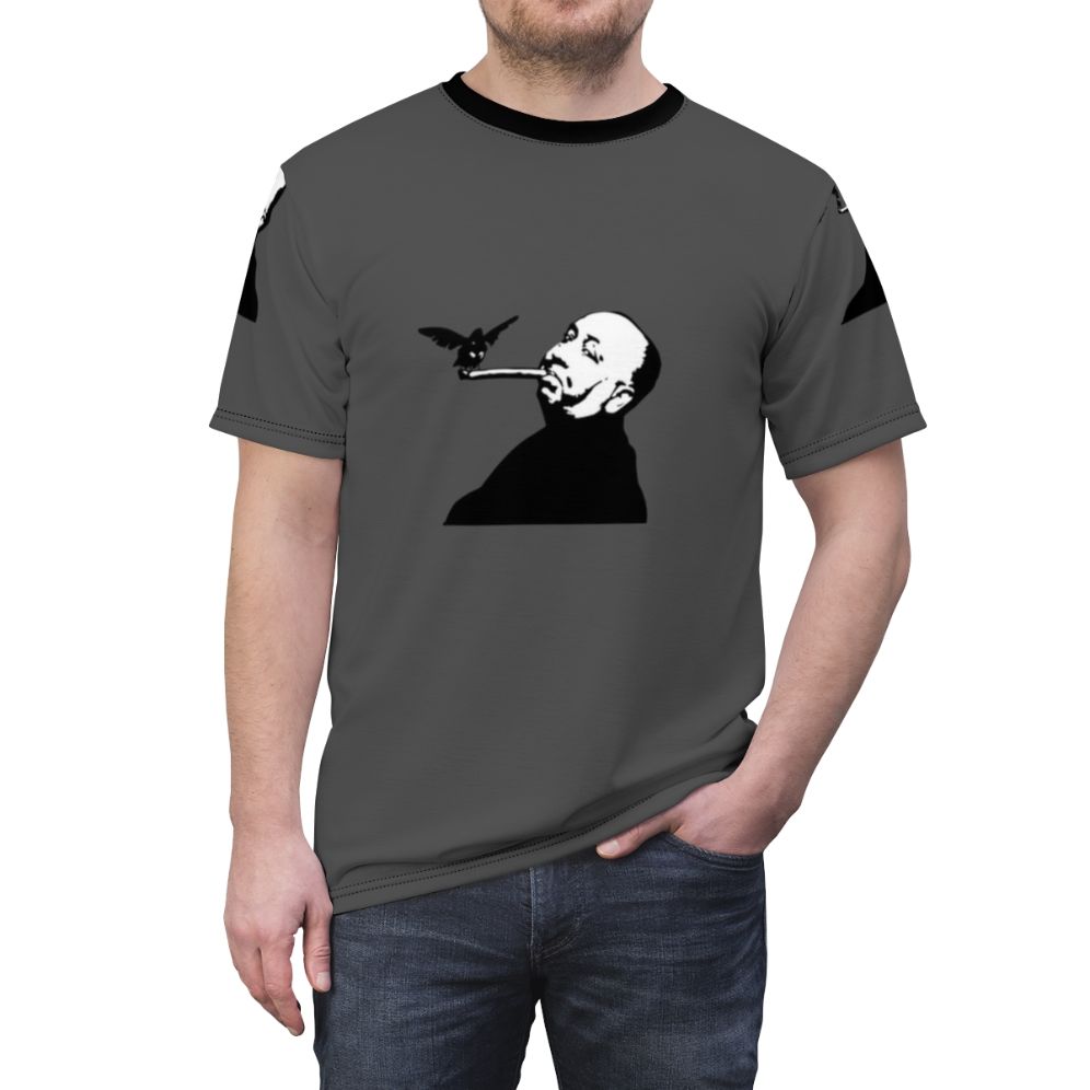 Artistic illustration of birds and a cigar, inspired by the work of Alfred Hitchcock, featured on an AOP t-shirt. - men front