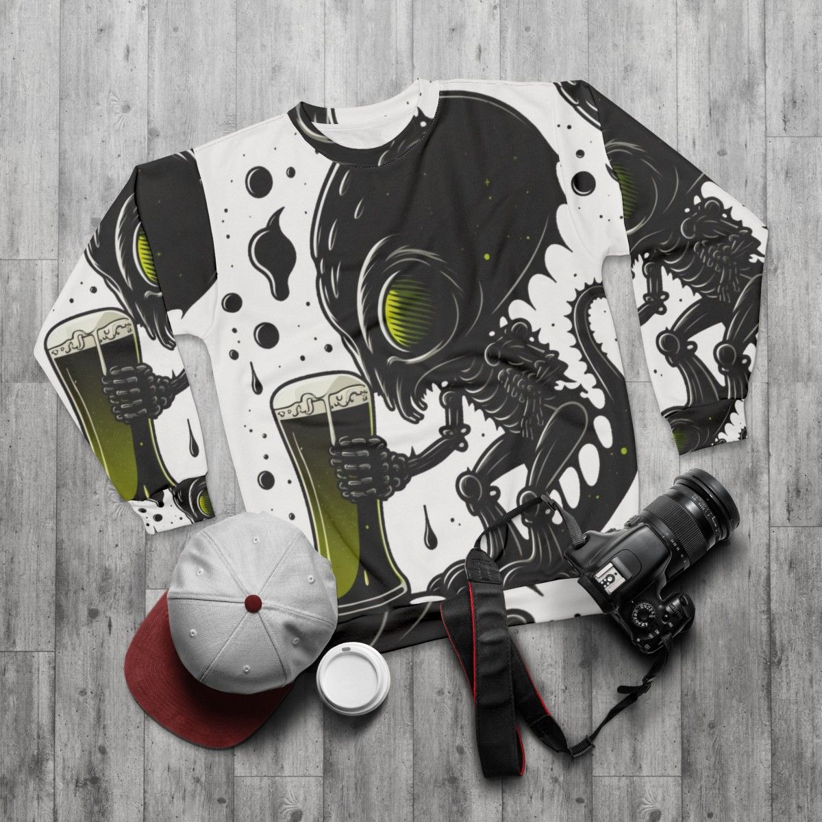 Intergalactic beer lover alien drinking art sweatshirt - flat lay