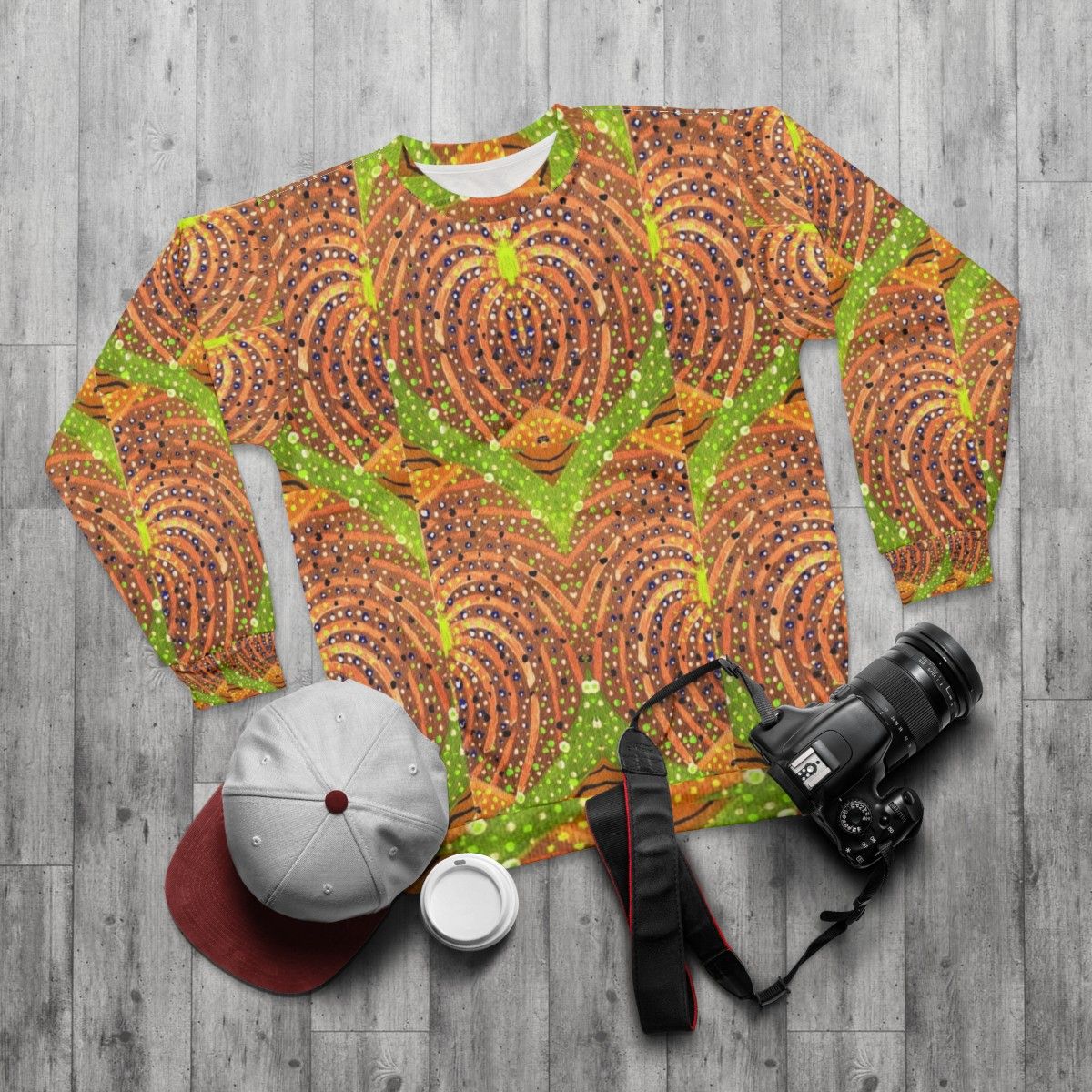 Colorful abstract autumn masquerade sweatshirt with organic fall pattern - flat lay