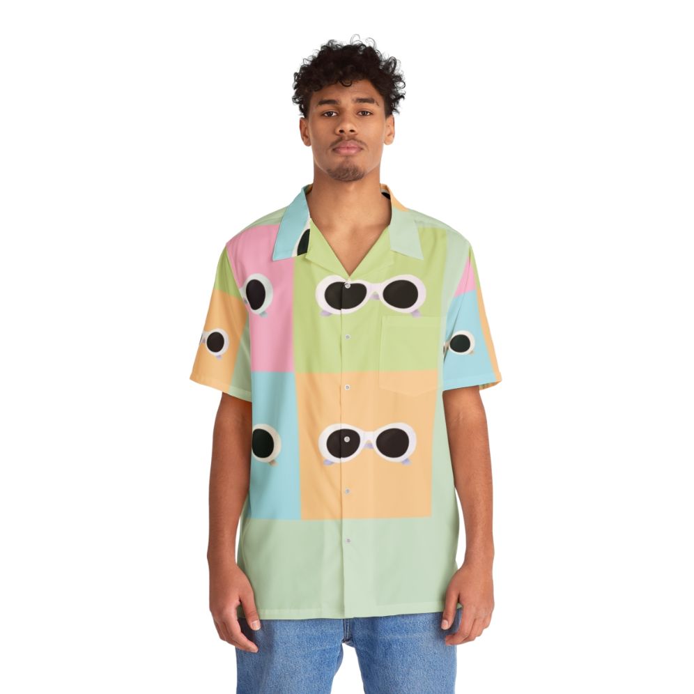 David Rose wearing a pastel rainbow Hawaiian shirt with a pop art design - People Front