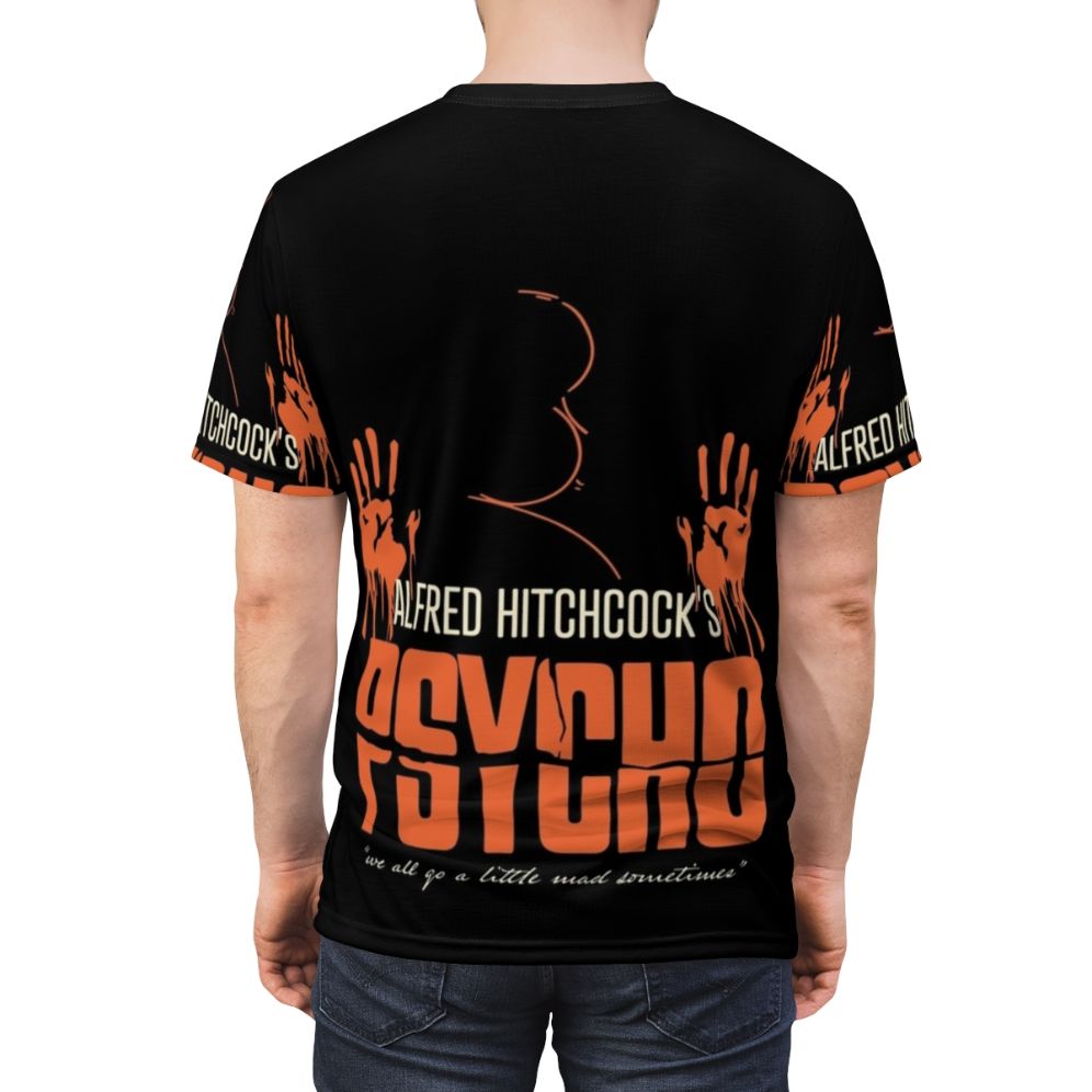 Vintage inspired t-shirt featuring an abstract portrait design of iconic director Alfred Hitchcock and references to his classic thriller film "Psycho" - men back