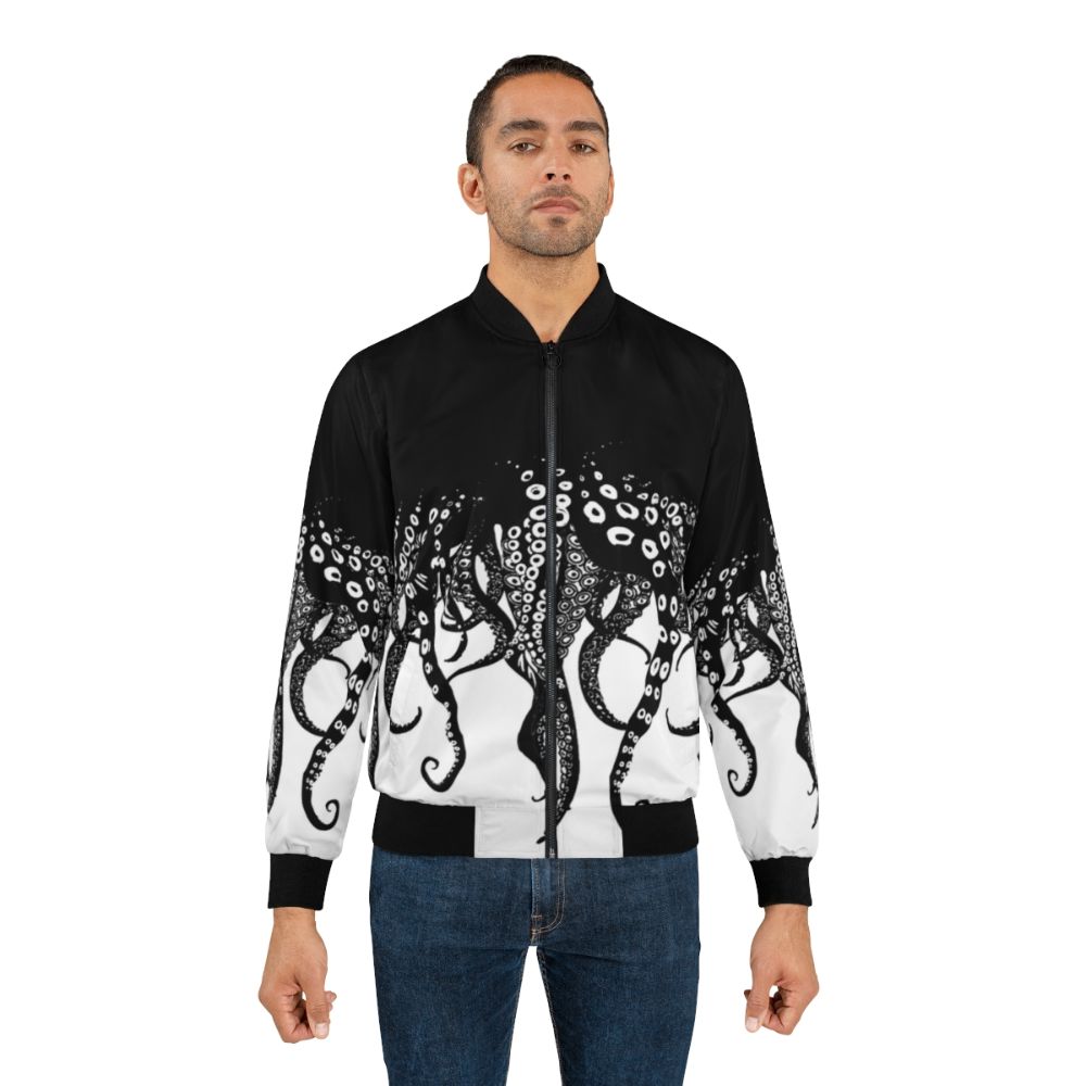 A black and white bomber jacket featuring a unique tentacle design inspired by Lovecraft's Cthulhu mythos. - Lifestyle