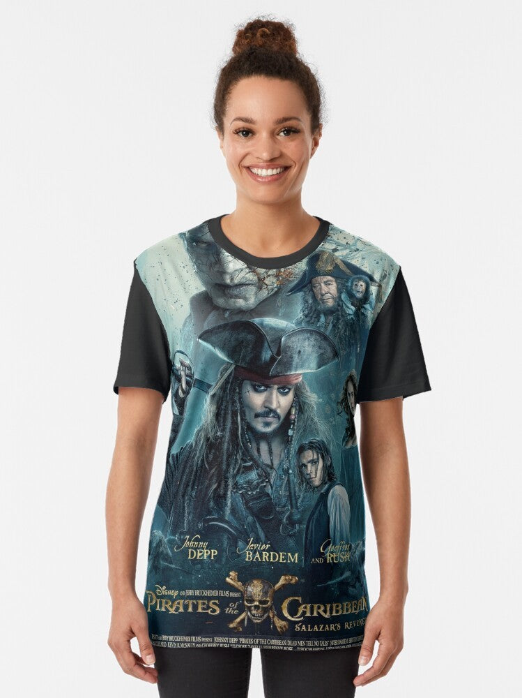 A graphic t-shirt featuring the movie "Pirates of the Caribbean: Dead Men Tell No Tales" with characters like Jack Sparrow, Davy Jones, and Will Turner. - Women