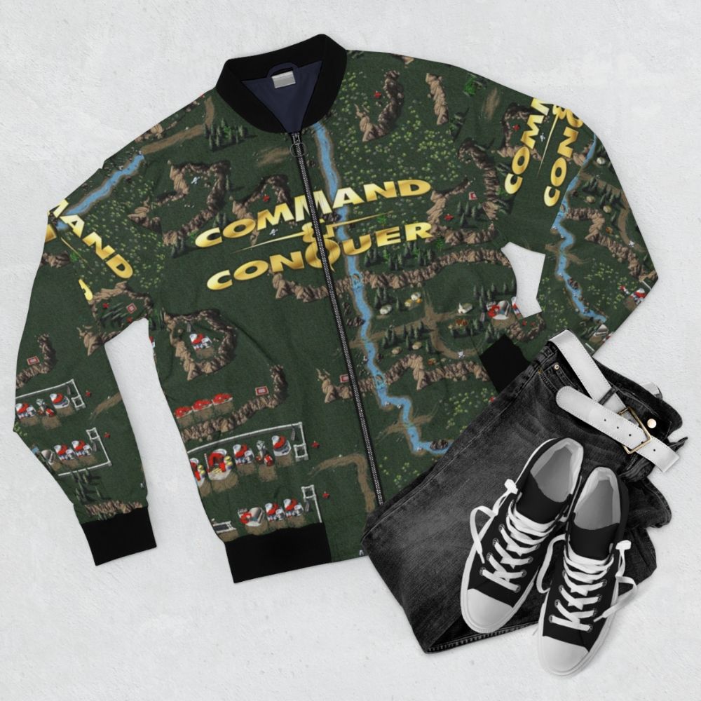 Vintage-inspired bomber jacket featuring the Command & Conquer retro gaming logo and design - Flat lay