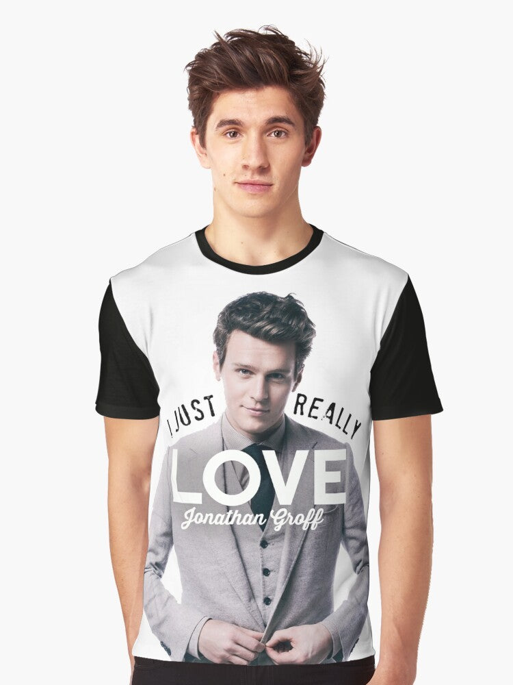 A graphic t-shirt featuring Jonathan Groff, known for his roles in Hamilton, Spring Awakening, and Glee. - Men