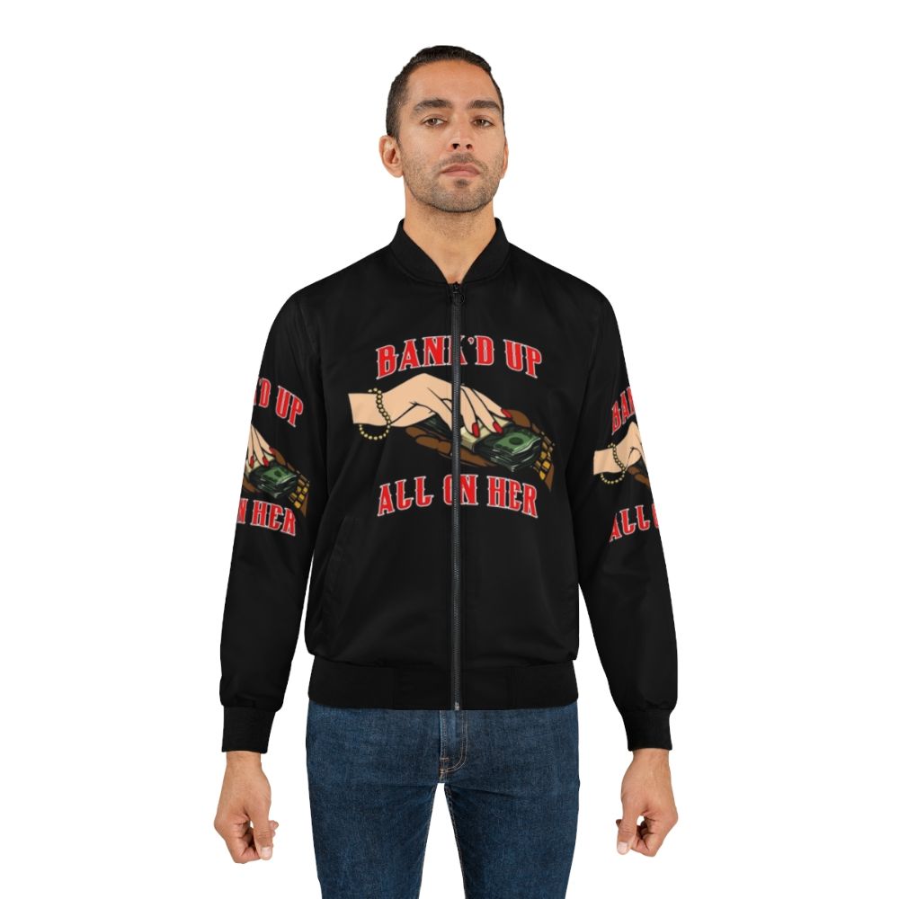 A black and red bomber jacket with a bold urban design. - Lifestyle