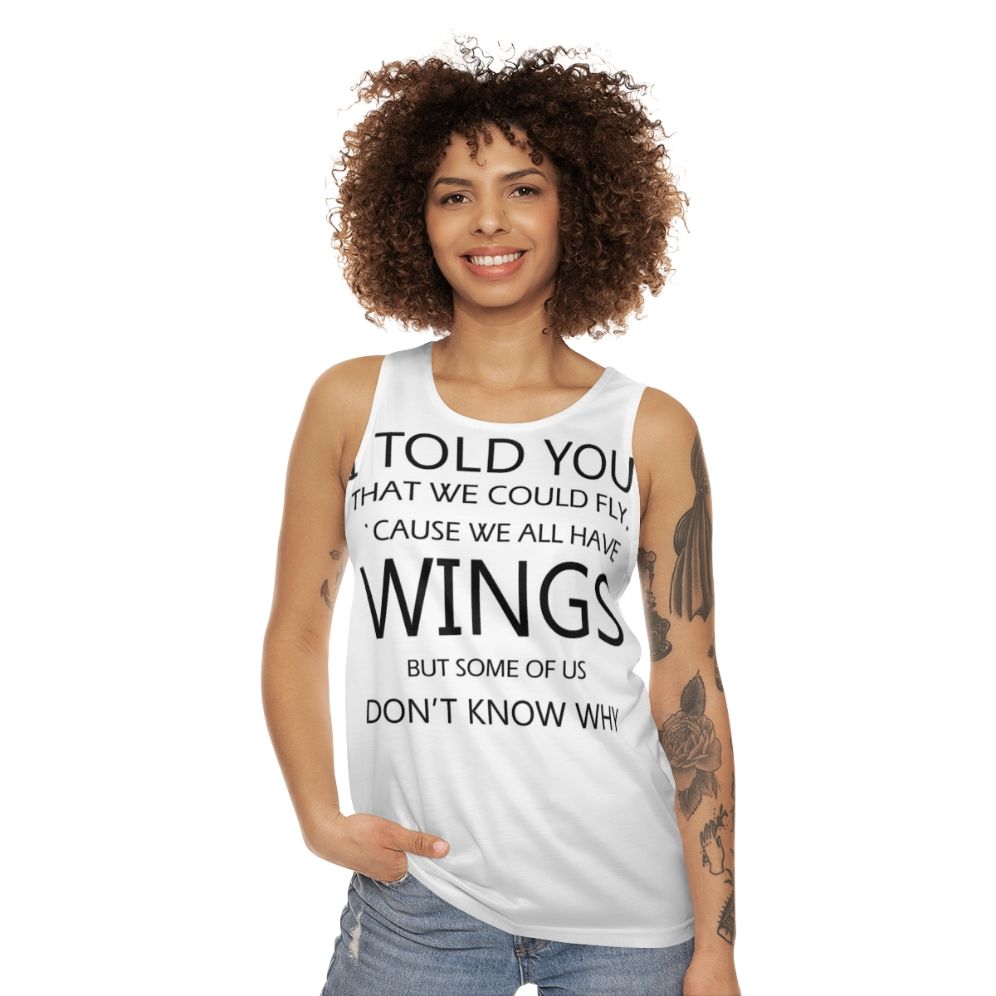 Unisex retro-style tank top with "Never Tear Us Apart" music quote - women