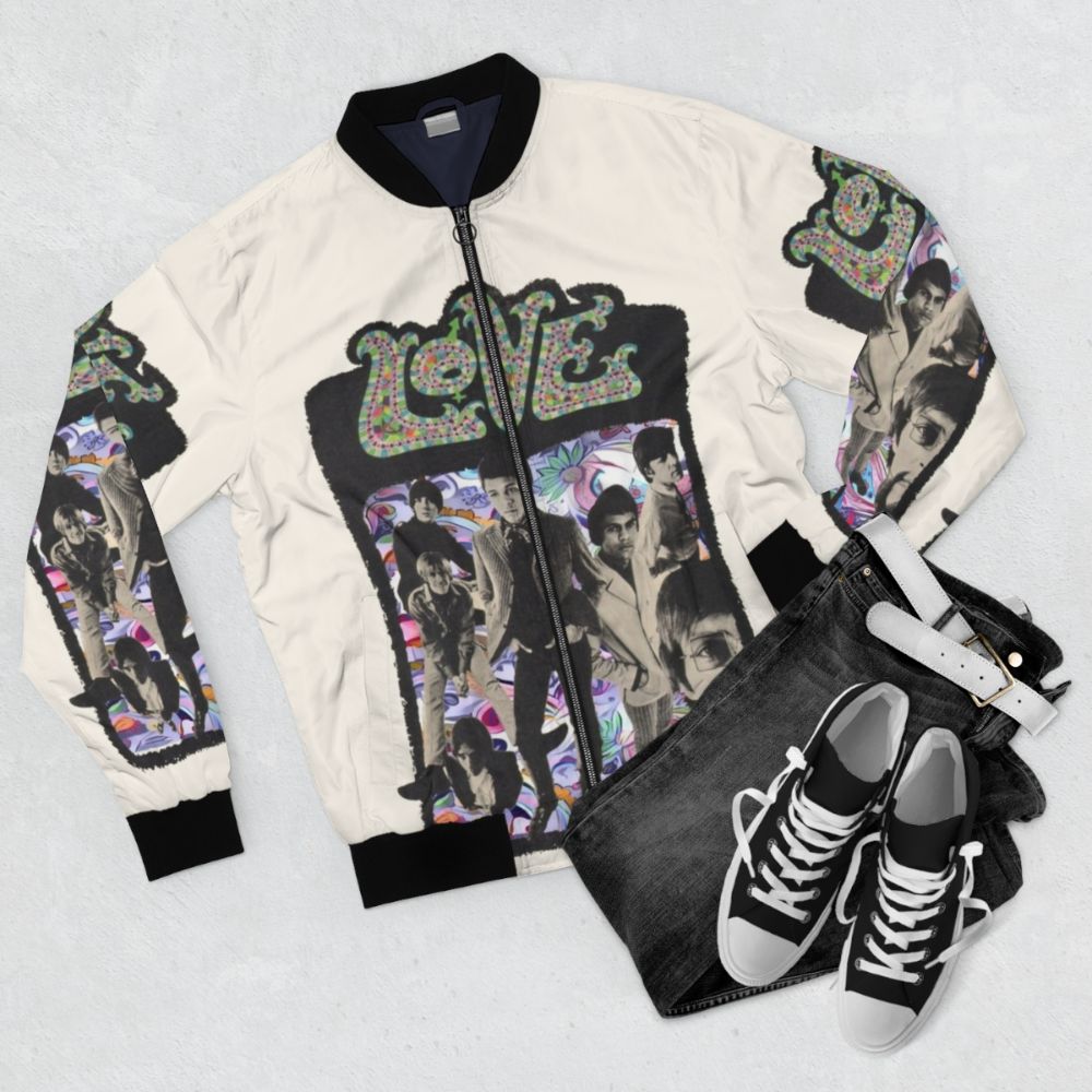 Vintage 1960s psychedelic rock bomber jacket featuring the band Love and founder Arthur Lee - Flat lay