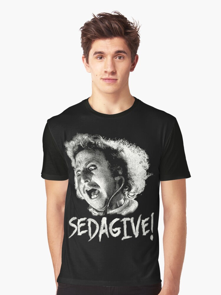 A graphic t-shirt featuring the iconic "Sedagive!" quote from the classic comedy film "Young Frankenstein" starring Gene Wilder. - Men