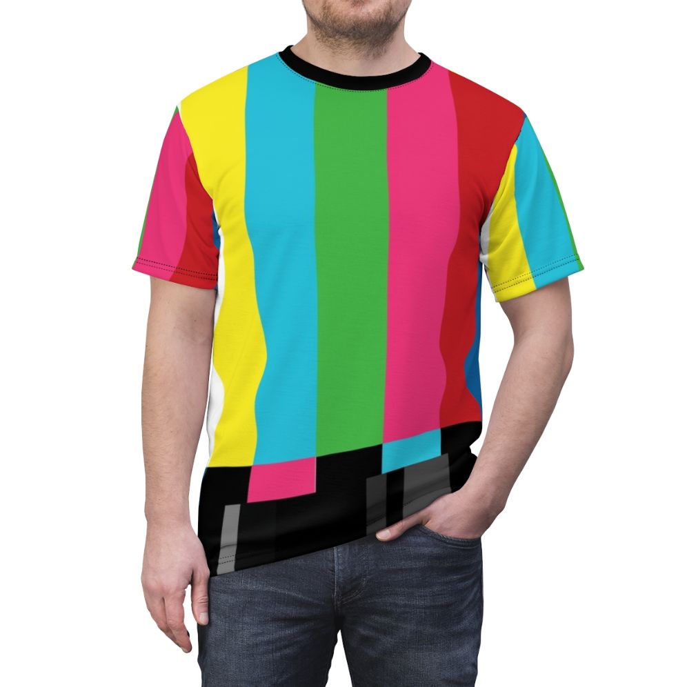 A vibrant and retro-inspired t-shirt featuring a pattern of colorful television color bars, perfect for fans of vintage technology and pop culture. - men front