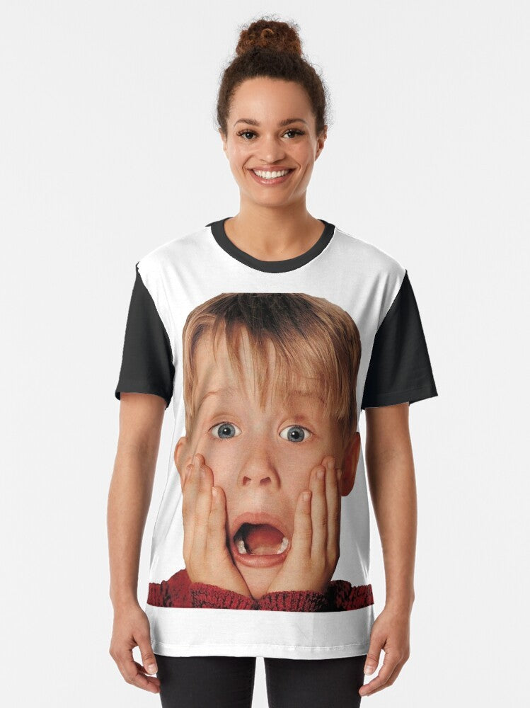 Macaulay Culkin wearing a red shirt in the iconic "Home Alone" movie poster graphic on a t-shirt - Women