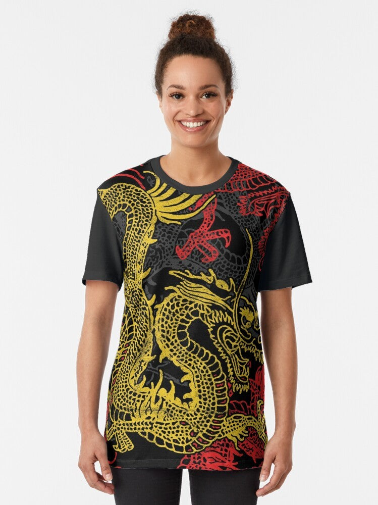 Graphic t-shirt featuring a golden Chinese dragon pattern, a mythical and powerful creature from Asian folklore. - Women