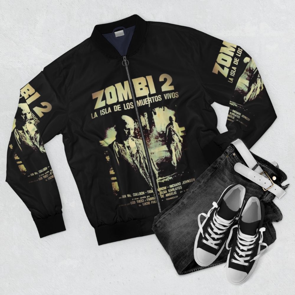 Zombi 2 horror-themed bomber jacket with zombie and gore graphics - Flat lay