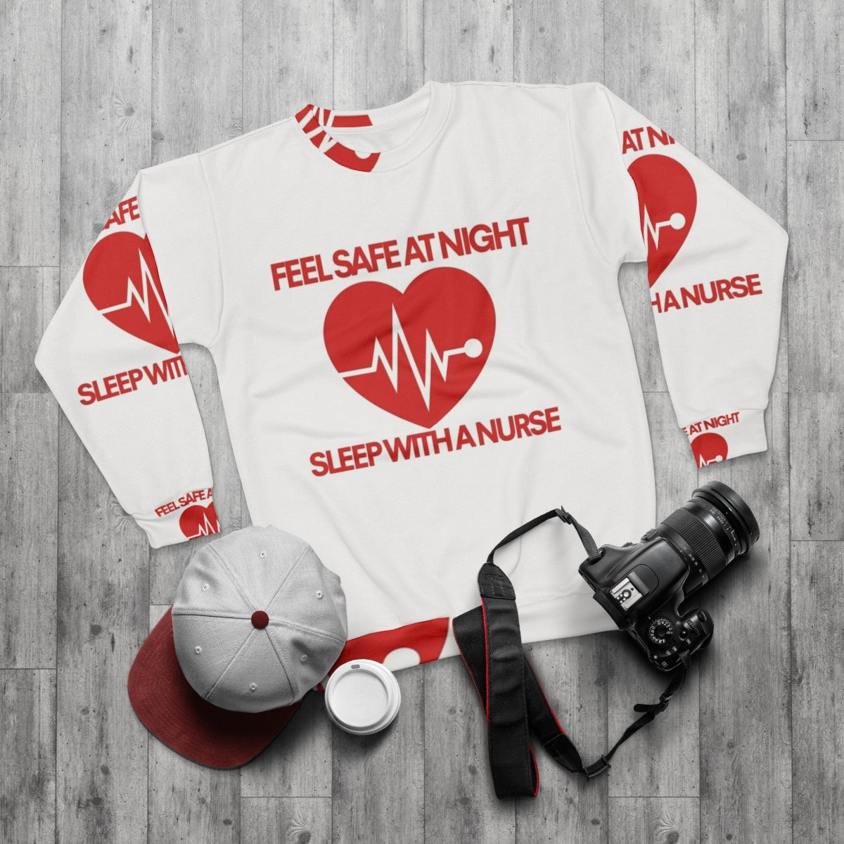 Nurse sweatshirt with "Sleep with a nurse" design for night safety and humor - flat lay