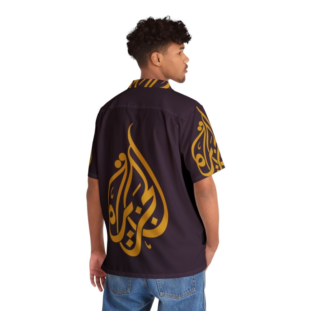 Al Jazeera inspired Hawaiian shirt featuring Arabic TV and middle eastern style - Flat lay