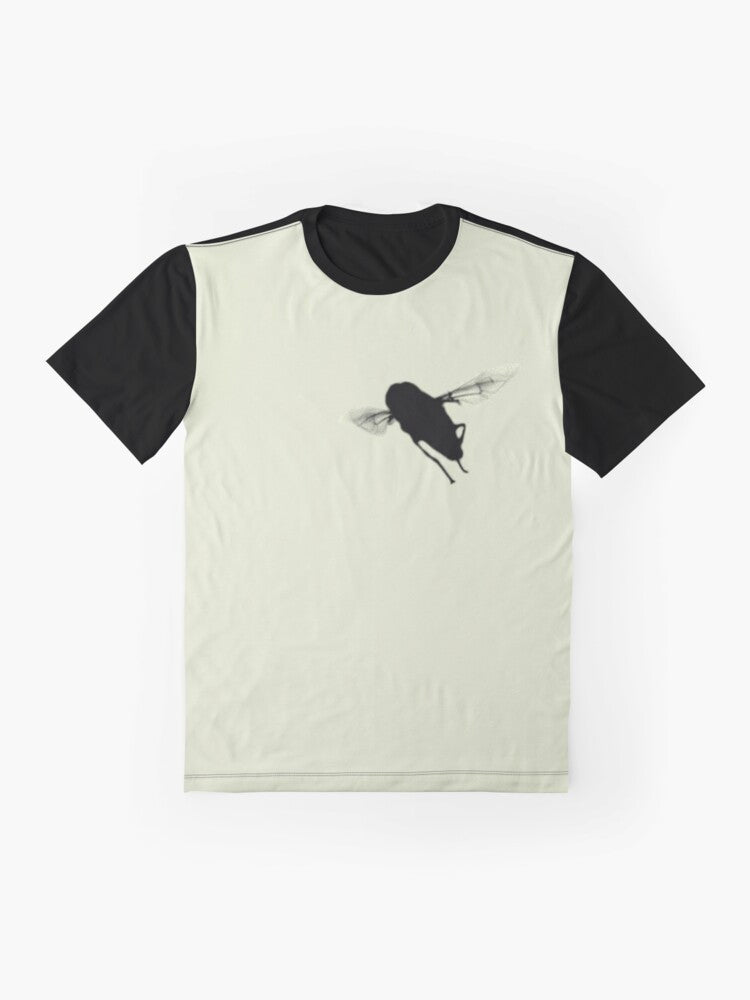 A minimalist silhouette design of a hover fly or syrphid fly on a black and cream t-shirt. - Flat lay